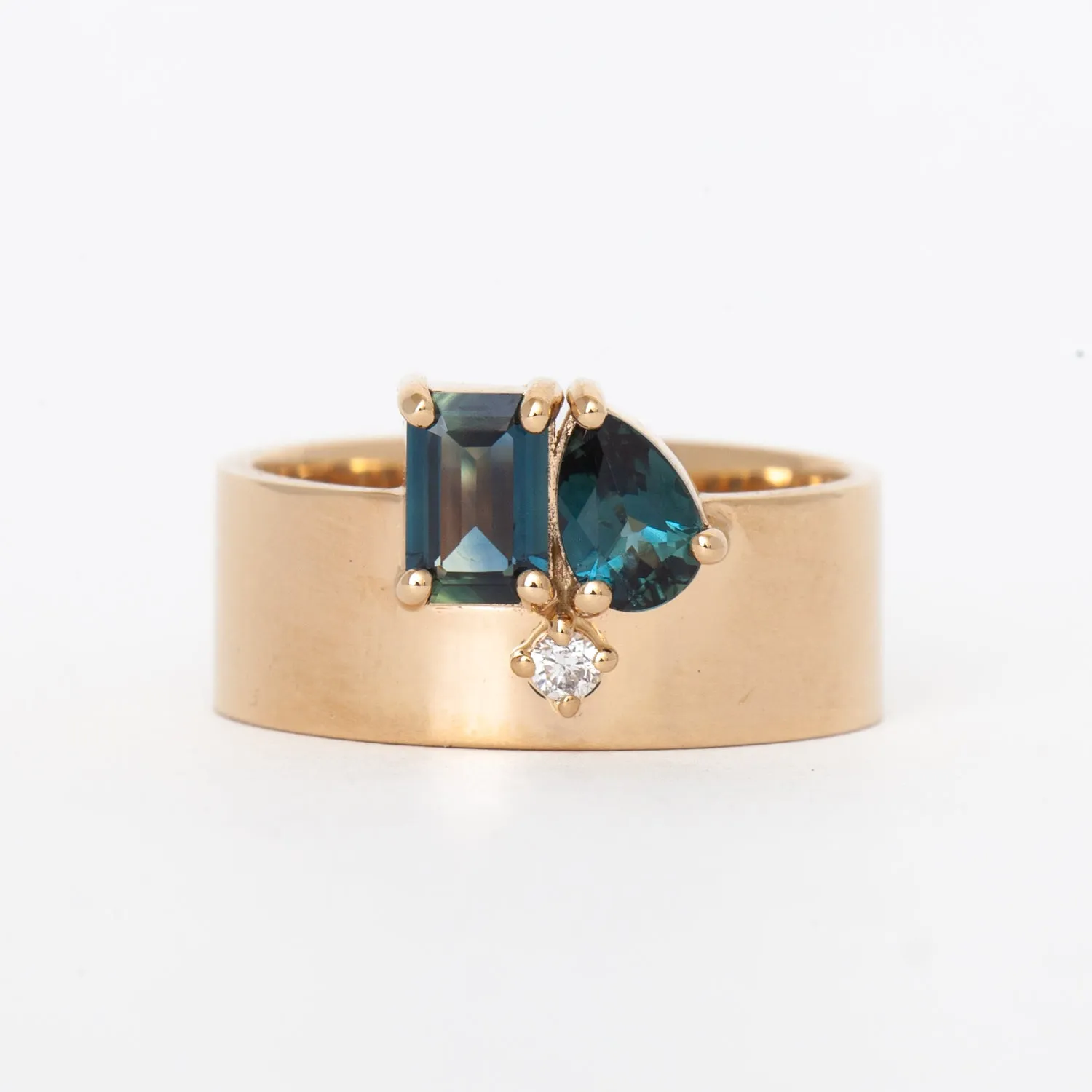 Emerald and Pear Cut Sapphire and Diamond Bricolage Ring