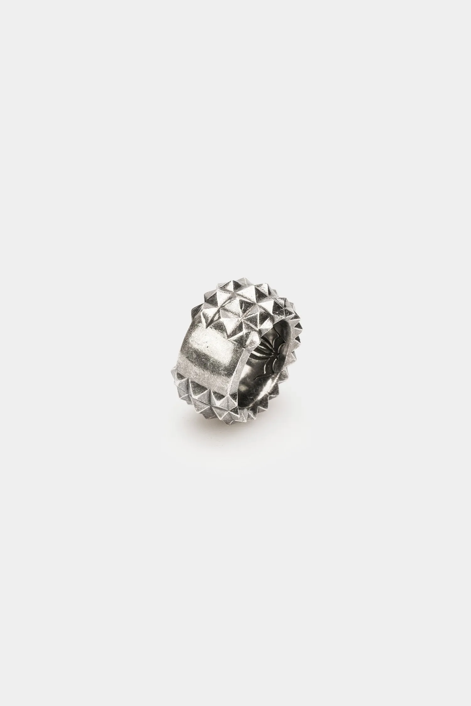 Studded silver band ring